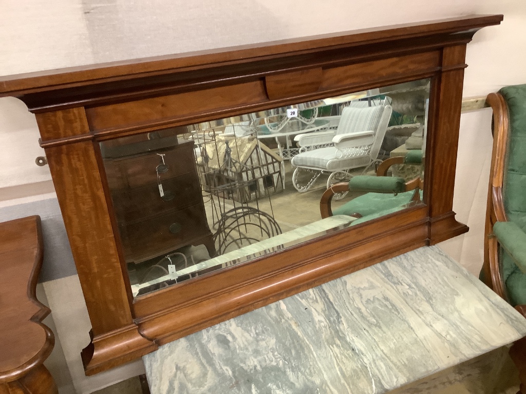 An early 20th century mahogany overmantel mirror, width 144cm, height 77cm